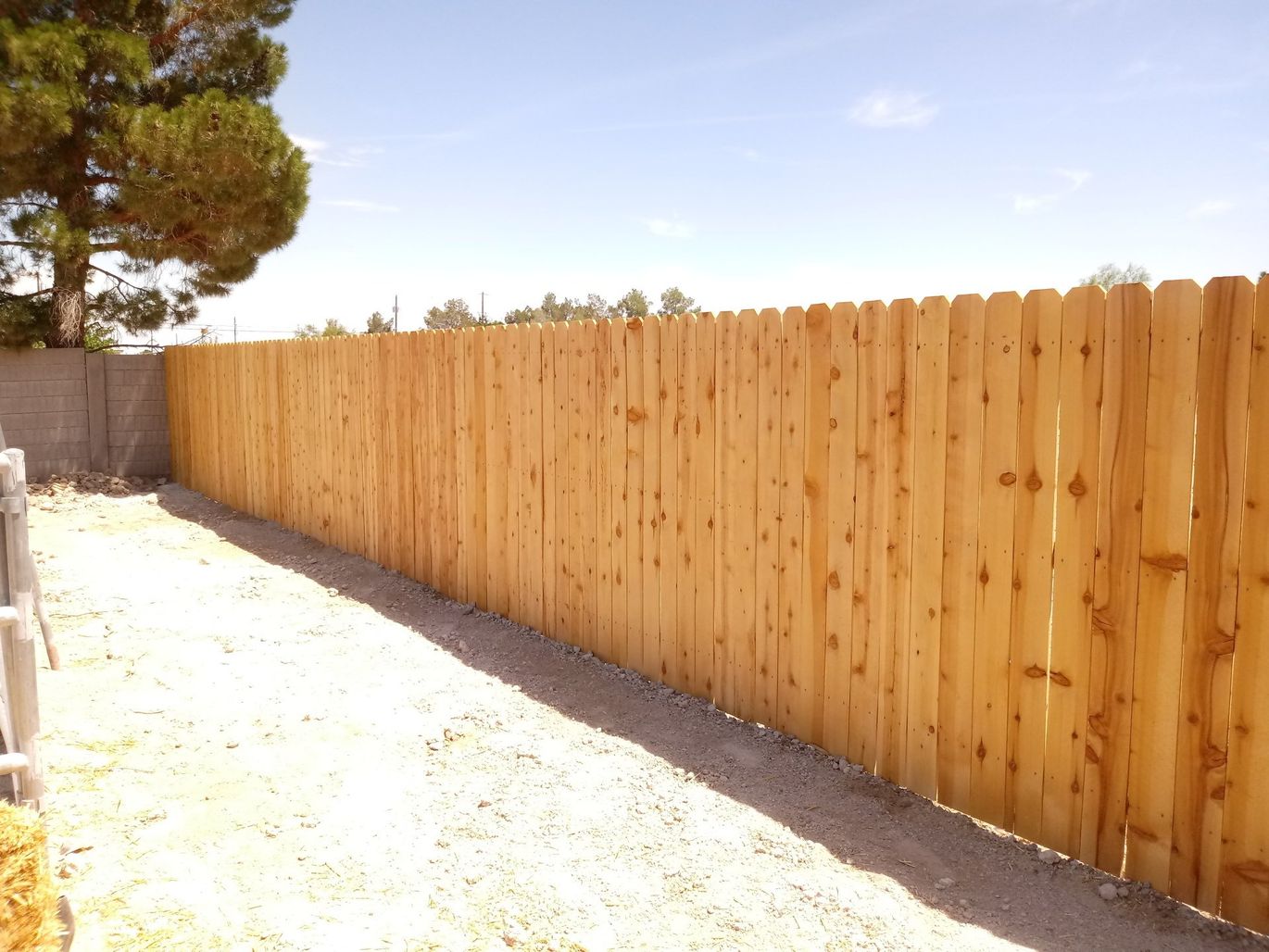 Wood fencing with light finish